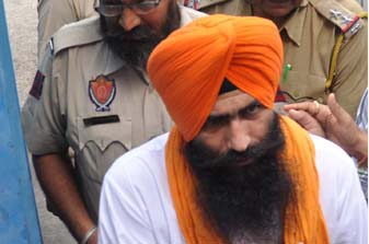 Bakhshish Singh in police custody [File Photo]