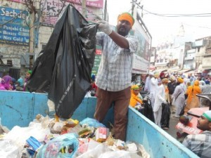 Cleaning up the streets during the Nagar Kirtan