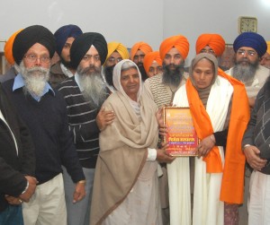Families of Sikh Martyrs of Saka Nakodar being honoured by Sikh bodies