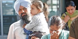 Ranvir Singh Lali with son Bachint and wife Shubhneet Kaur at Auckland Airport after mother and son were released. 