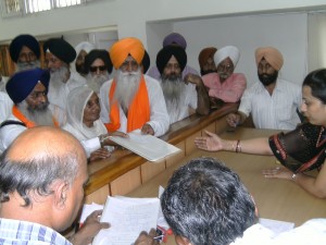 Justice Ajit Singh Bains, Mata Gurnam Kaur and others accompanying Bhai Harpal Singh Cheema, as he files nomination papers for SGPC elections on 10 August, 2011 | Photo: Sikh SiySasat Network